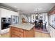 Spacious kitchen featuring a center island, stainless steel appliances, and hardwood flooring at 10846 Hamilton Pass, Fishers, IN 46037