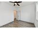 A blank bedroom boasts new flooring, fresh paint, and ample natural light at 10880 N 23Rd St, Elwood, IN 46036