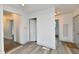 View of the open concept home with white walls and laminate flooring at 10880 N 23Rd St, Elwood, IN 46036