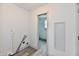 Laundry room with water hookups ready for new washer and dryer with view into the bathroom at 10880 N 23Rd St, Elwood, IN 46036
