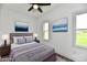 Comfortable bedroom features a queen bed, plush pillows, and framed artwork at 10880 N 23Rd St, Elwood, IN 46036