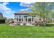 Spacious backyard with a patio area, perfect for outdoor activities and relaxation at 11509 Wildlife Ct, Zionsville, IN 46077