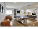 Finished basement with ping pong table, living area, storage, and space for recreation and entertainment at 11509 Wildlife Ct, Zionsville, IN 46077