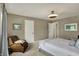 Spacious bedroom includes neutral walls, carpeted floors, and recessed lights at 11509 Wildlife Ct, Zionsville, IN 46077