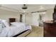 Comfortable main bedroom with barn door leading to bathroom at 11509 Wildlife Ct, Zionsville, IN 46077