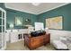 Stylish home office with custom built-ins, wainscoting, and a neutral color palette at 11509 Wildlife Ct, Zionsville, IN 46077