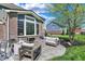 Relaxing patio featuring a modern fire pit and comfortable outdoor seating area at 11509 Wildlife Ct, Zionsville, IN 46077