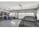 Clean, organized two car garage with overhead lighting and storage shelves at 11685 Platt St, Noblesville, IN 46060