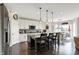 Modern eat-in kitchen featuring granite countertops, stainless steel appliances, and center island with seating at 11685 Platt St, Noblesville, IN 46060