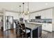 Bright kitchen with white cabinets, stainless steel appliances, and a center island with seating at 11685 Platt St, Noblesville, IN 46060