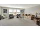 Cozy living room with carpet, comfortable seating and ample natural light at 11685 Platt St, Noblesville, IN 46060