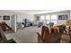 Large living room with lots of seating, natural light and a neutral color palette at 11685 Platt St, Noblesville, IN 46060