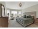 Serene main bedroom featuring large windows, ample natural light, and a plush bed at 11685 Platt St, Noblesville, IN 46060