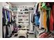 Walk-in closet with built-in shelving and ample storage for clothing, shoes, and accessories at 11685 Platt St, Noblesville, IN 46060