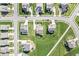 Stunning aerial view of a neighborhood showcasing well-manicured lawns and neatly arranged single-Gathering homes at 12894 Corydon Dr, Fishers, IN 46037
