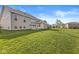 Expansive green backyard, ideal for outdoor activities and enjoying the home's exterior at 12894 Corydon Dr, Fishers, IN 46037