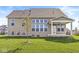 Spacious backyard with a covered porch, ideal for outdoor entertaining and relaxation at 12894 Corydon Dr, Fishers, IN 46037