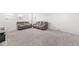 Spacious basement area with neutral carpet and modern furniture, great for entertaining or relaxing at 12894 Corydon Dr, Fishers, IN 46037