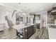Beautiful open kitchen with a large island, stainless steel appliances, and a walk-in pantry at 12894 Corydon Dr, Fishers, IN 46037