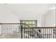 Upper level loft area overlooking the living room with natural light at 12894 Corydon Dr, Fishers, IN 46037