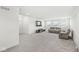 Large living room featuring neutral carpet and reclining chairs at 12894 Corydon Dr, Fishers, IN 46037