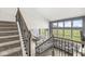 Bright, open living room and dining area with large windows and gray decor at 12894 Corydon Dr, Fishers, IN 46037