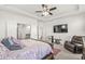Relaxing main bedroom with ensuite bathroom and cozy sitting area at 12894 Corydon Dr, Fishers, IN 46037