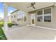 Relaxing outdoor patio featuring a ceiling fan, ideal for enjoying the backyard view at 12894 Corydon Dr, Fishers, IN 46037
