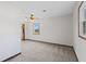Comfortable bedroom with carpet, ceiling fan, and window allowing lots of natural light at 13 N Main St, Brooklyn, IN 46111