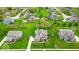 Beautiful suburban home with lush landscaping and sprawling lawn in a desirable neighborhood with ponds and mature trees at 1533 Windswept, Brownsburg, IN 46112