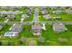 Beautiful suburban home with a large lot, professionally landscaped yard, and inviting outdoor living space with a fire pit at 1533 Windswept, Brownsburg, IN 46112