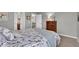 Serene bedroom with a large dresser, soft carpet, and a calming atmosphere at 1533 Windswept, Brownsburg, IN 46112