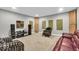 Well-lit living room with comfortable seating and acoustic panels for superior sound quality at 1533 Windswept, Brownsburg, IN 46112