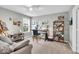 Bright home office with comfortable seating, natural light, and a desk space at 1533 Windswept, Brownsburg, IN 46112