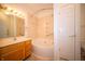 Bathroom featuring a large soaking tub and wooden vanity at 1575 Sierra Springs, Carmel, IN 46280