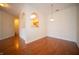 Dining area showing hardwood floors and a view of the kitchen at 1575 Sierra Springs, Carmel, IN 46280