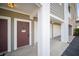 Close-up of a condo unit entrance featuring a private door and access to garage at 1575 Sierra Springs, Carmel, IN 46280