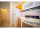 Kitchen featuring white appliances, wood cabinets, and convenient layout at 1575 Sierra Springs, Carmel, IN 46280