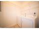Laundry room with white washer and dryer, and wire shelving at 1575 Sierra Springs, Carmel, IN 46280