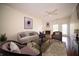 Cozy living room boasting a fireplace, ample seating, and natural light at 1575 Sierra Springs, Carmel, IN 46280