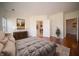 Bedroom with hardwood flooring, closet, and furnishings at 1575 Sierra Springs, Carmel, IN 46280