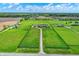 Aerial view of an estate featuring lush green pastures, and multiple residences at 1581 S 825 E, Zionsville, IN 46077
