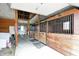 Spacious barn interior featuring wooden stalls with metal bars, offering a rustic yet functional equestrian setup at 1581 S 825 E, Zionsville, IN 46077