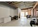 Unfinished basement with exposed ceiling beams, walkout access and a blank canvas at 1581 S 825 E, Zionsville, IN 46077