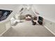Large bedroom featuring eclectic decor with a white sofa, a bed, a TV and an American Flag at 1581 S 825 E, Zionsville, IN 46077