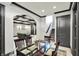 Stylish dining area with coffered ceilings, access to living area and view of staircase at 1581 S 825 E, Zionsville, IN 46077