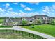 Expansive stone home features a long driveway and lush green lawn at 1581 S 825 E, Zionsville, IN 46077