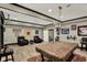 Recreational room with a pool table and seating with adjacent lounging area at 1581 S 825 E, Zionsville, IN 46077