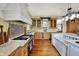 Charming kitchen with marble counters and lots of cabinet space at 1581 S 825 E, Zionsville, IN 46077