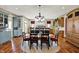 Spacious kitchen with a large island, breakfast table, and hardwood floors at 1581 S 825 E, Zionsville, IN 46077